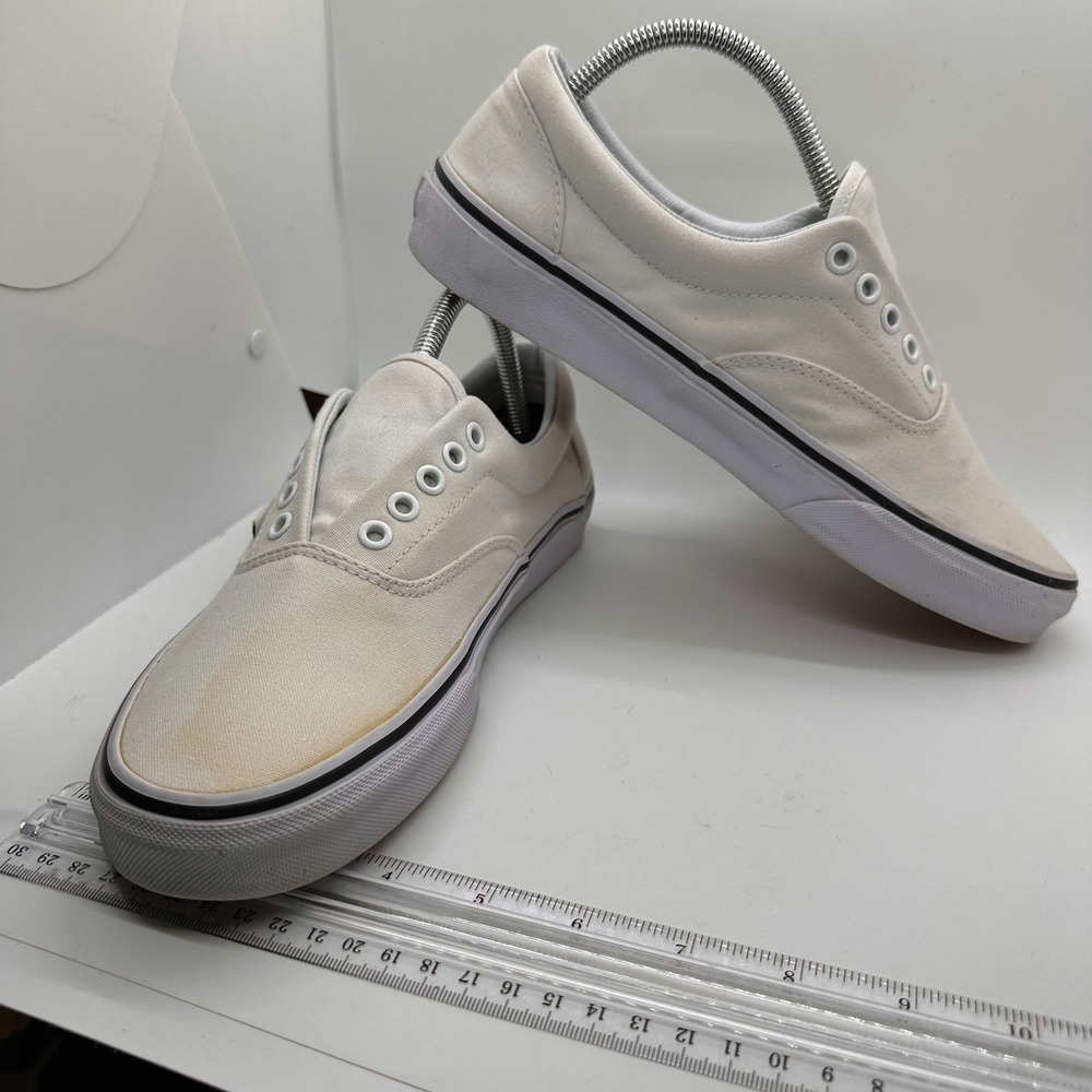 Vans White Canvas Slip-On Style Sneakers